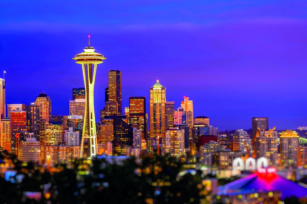 Seattle city skyline at dusk. Downtown Seattle cityscape with Space Needle.